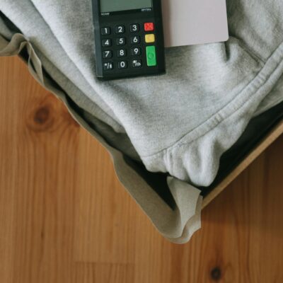 Black Remote Control on Gray Textile