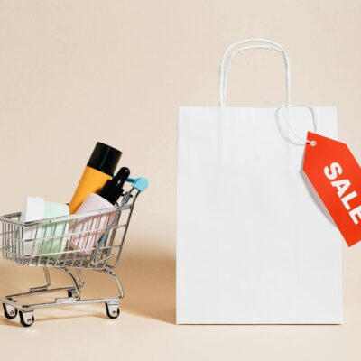 Shopping Cart Next to a Shopping Bag